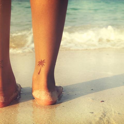 3. Symbolik von Palmen-Tattoos: Weisheit, Sieg und Frieden 3. Symbolik von Palmen-Tattoos: Weisheit, Sieg und Frieden