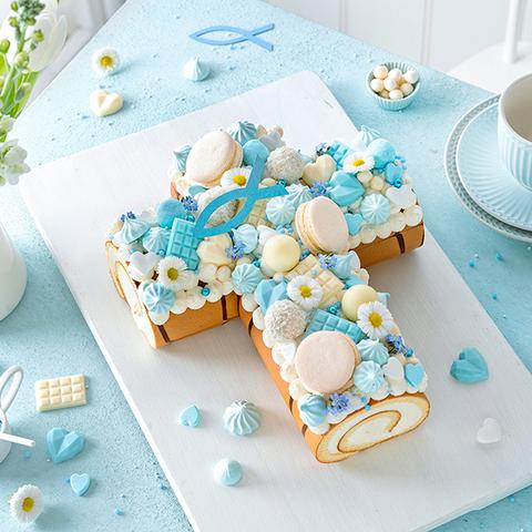 Von Symbolen inspiriert: Wie du eine einzigartige Tauftorte selber backen kannst Von Symbolen inspiriert: Wie du eine einzigartige Tauftorte selber backen kannst