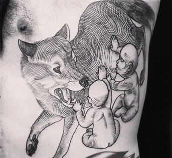 Ein Wolf-Tattoo als Ausdruck von Wildheit und Gefahr Ein Wolf-Tattoo als Ausdruck von Wildheit und Gefahr